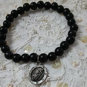 Black Beaded Bracelet with Silver Medallion